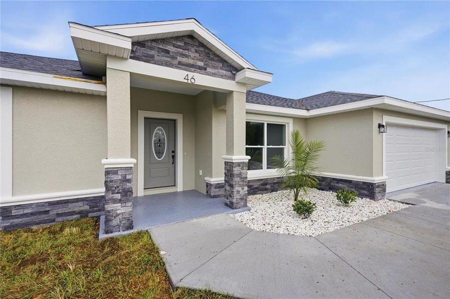 Exterior details and patio area of a home in , Ocala (Image 17).