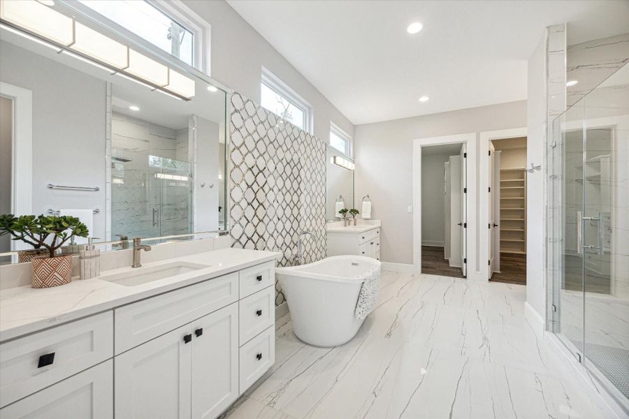 Primary Bathroom with glass enclosed shower, dual vanities and private w/c Primary Bathroom with glass enclosed shower, dual vanities and private w/c