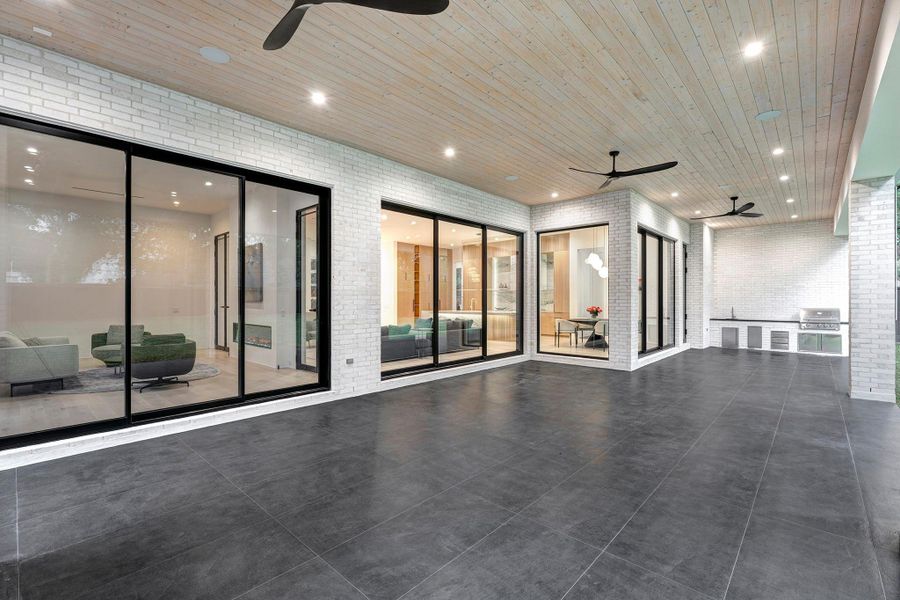 Exterior details and patio area of a home in , Houston (Image 3).