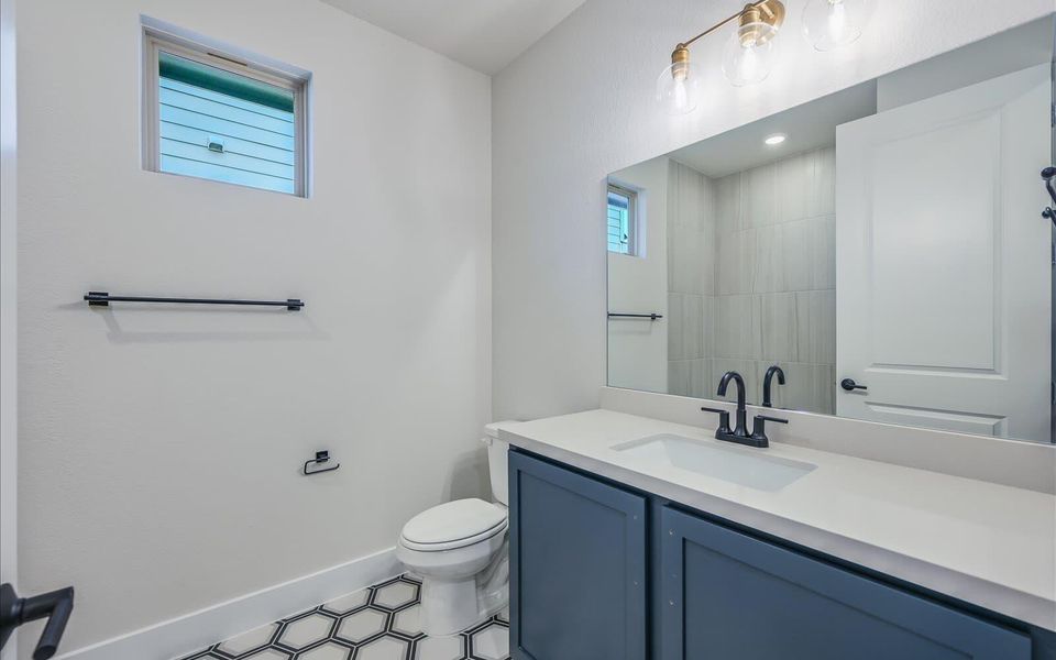Bathroom featuring toilet and vanity