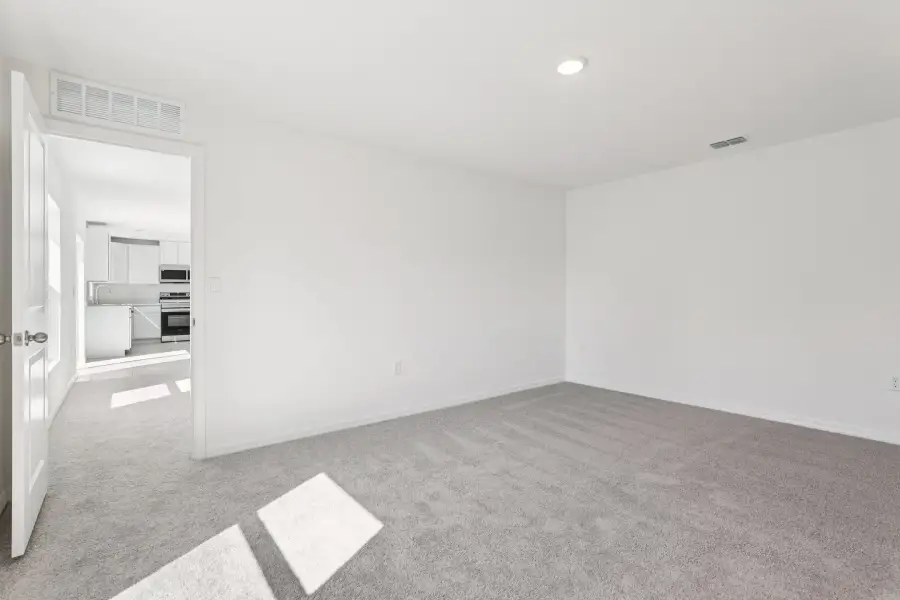 Representative unfurnished interior of a home built from the Poinsettia by Maronda Homes in Palm Bay, Palm Bay (Image 14).