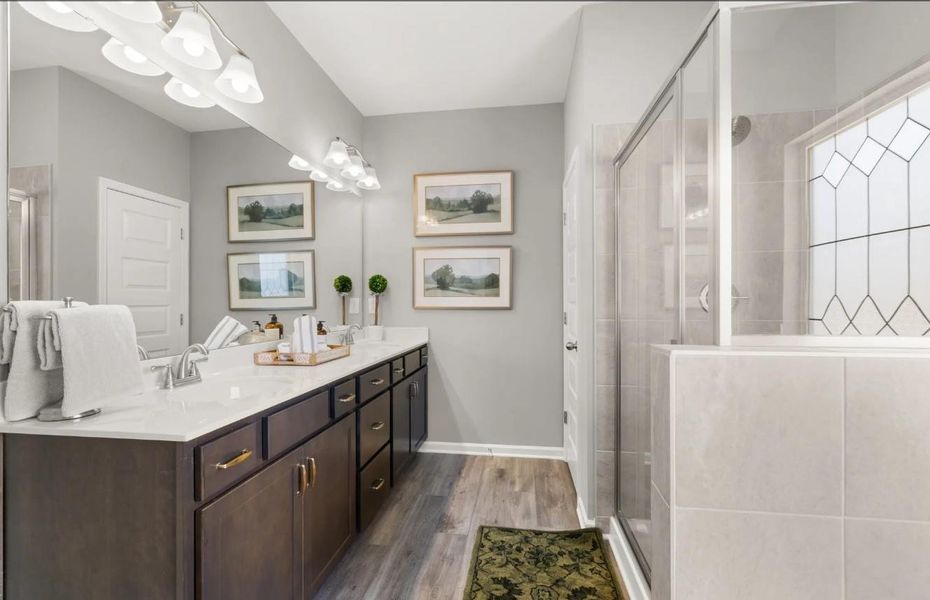 The Brambling- Primary Bath with Large Walk-in Shower. Home under construction. Sample photo used for illustrative purposes only, elevation, upgrades, selection, brick, siding and colors will vary. The Brambling- Primary Bath with Large Walk-in Shower. Home under construction. Sample photo used for illustrative purposes only, elevation, upgrades, selection, brick, siding and colors will vary.