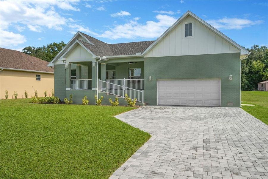 Front exterior of a new home in , Dade City, FL, highlighting curb appeal (Image 1).