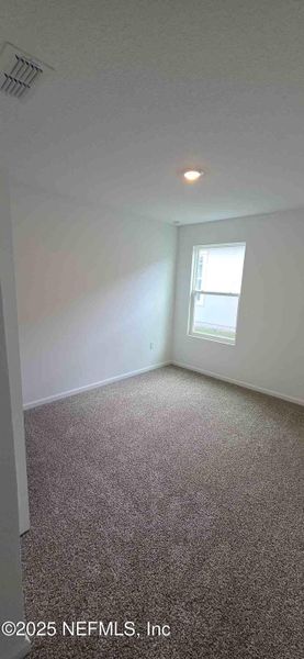 Spacious, unfurnished interior of a new home in The Arbors, Jacksonville (Image 18).