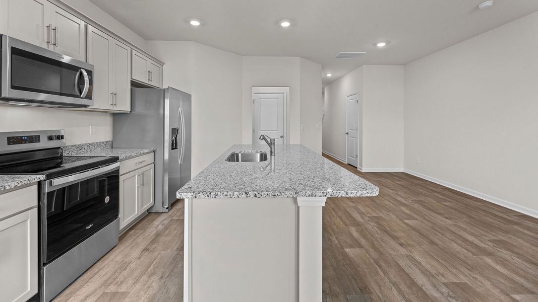 Furnished interior view inside a new home in The Townes at Ridgewood Farms, Winterville (Image 6).