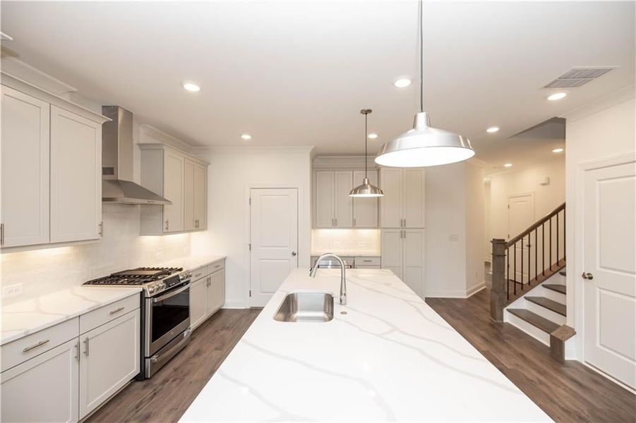 Kitchen - single bowl sink in island - Pictures represent a previously built home, not the actual home.