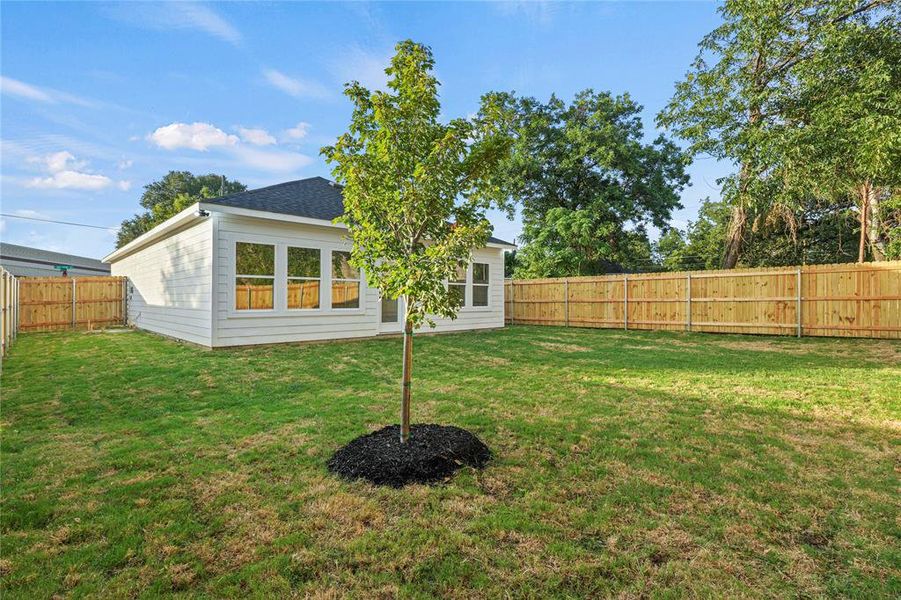 Front exterior of a new home in , Dallas, TX, highlighting curb appeal (Image 15).