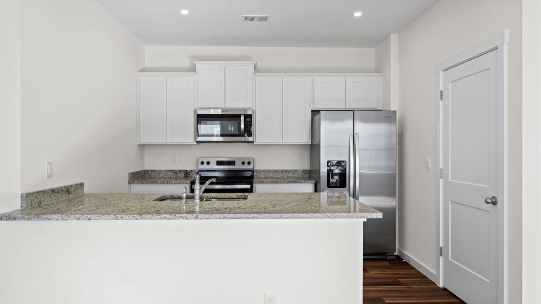 Representative furnished interior of a home built from the Southport by D.R. Horton in Cambridge Cove, Chickamauga (Image 6).