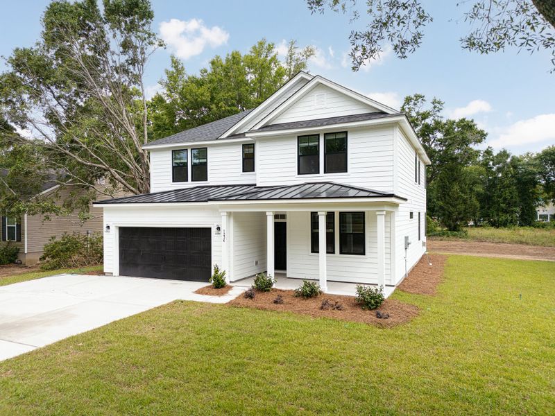 Representative exterior photo of a completed home built from the Avery by Hunter Quinn Homes in Beaufort County Homes, Beaufort, SC (Image 12).