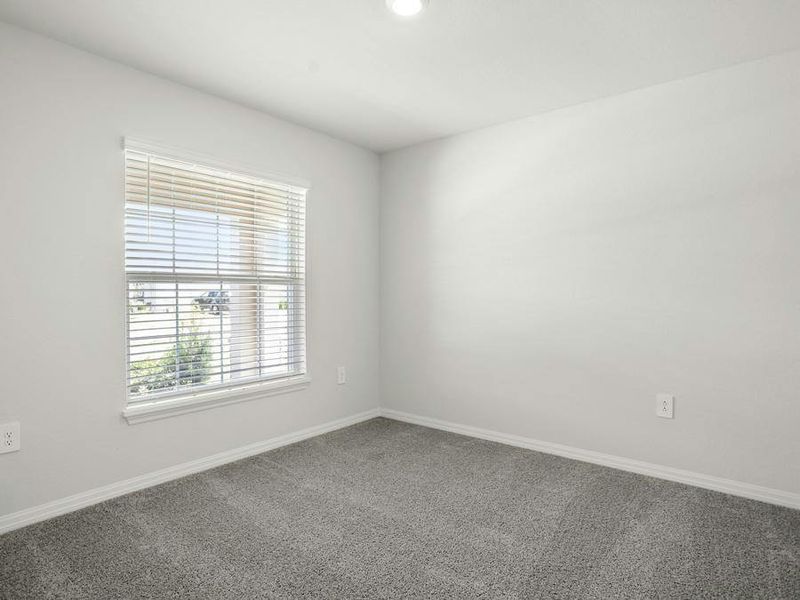 Secondary bedrooms provide space for everyone in your household.