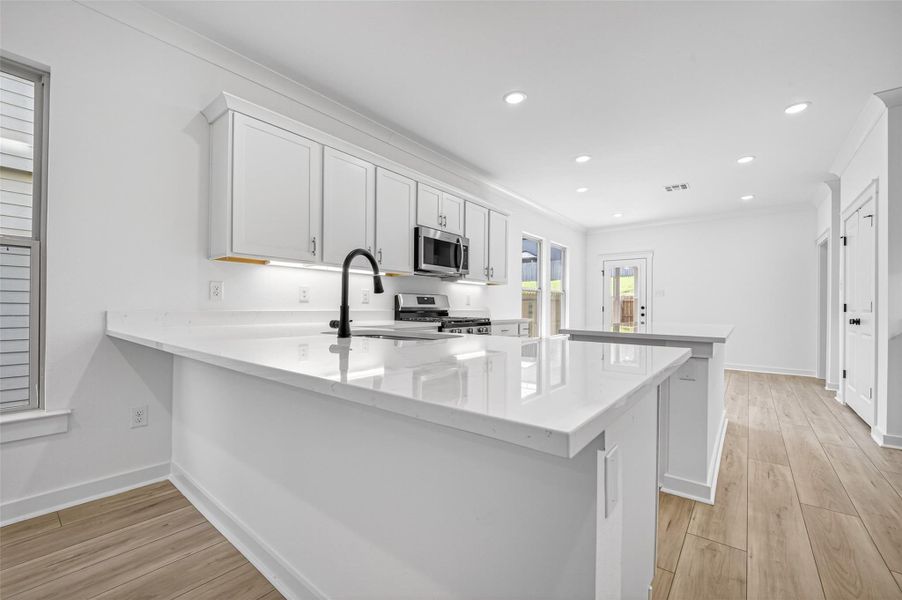 Furnished interior view inside a new home in Mostyn Springs, Magnolia (Image 11).