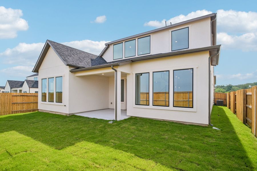 Exterior details and patio area of a home in Freedom at Anthem, Kyle (Image 3).