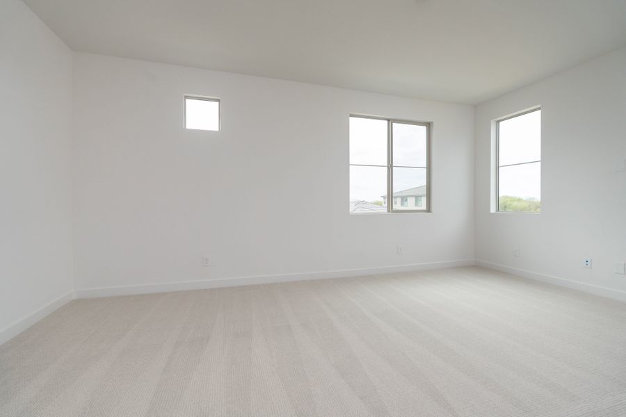 Spacious, unfurnished interior of a new home in Waterston Central, Gilbert (Image 15).