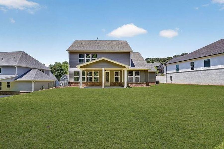 Exterior details and patio area of a home in The Manor at Gainesville Township, Gainesville (Image 20).