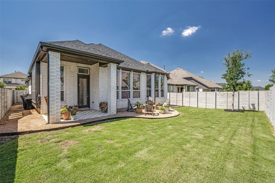 Spacious yard and walkway along the side of the home