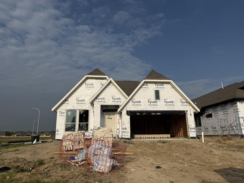 In-progress construction of a new home in Valencia, Manvel, TX (Image 8).
