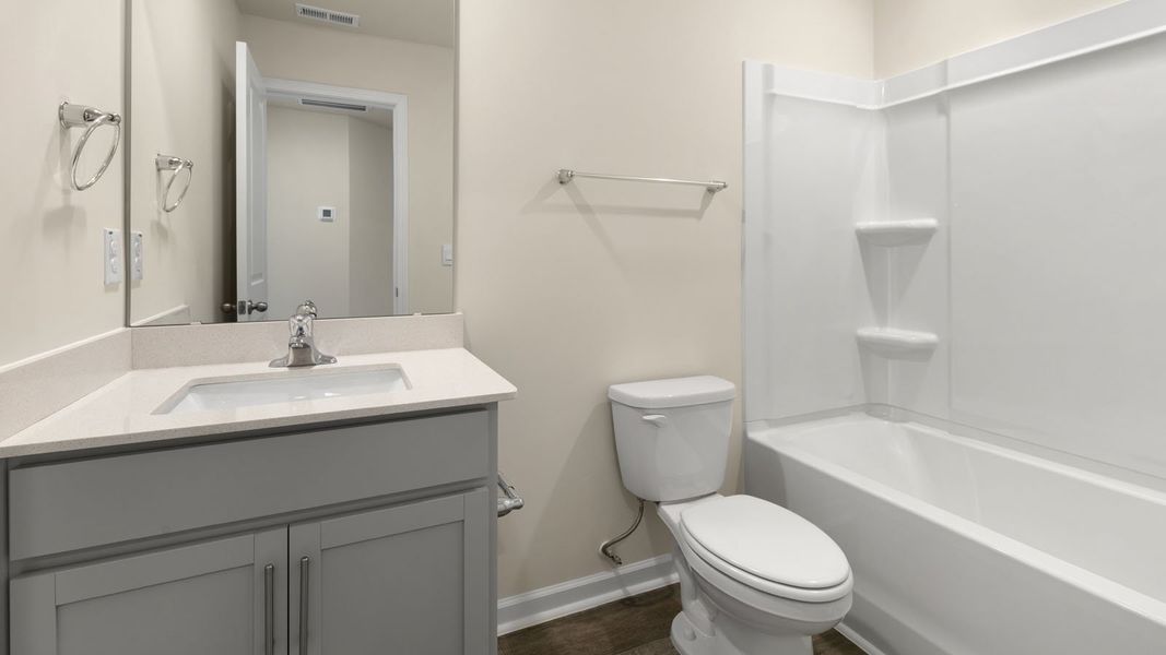 Furnished interior view inside a new home in Henley Ridge, Graham (Image 9).