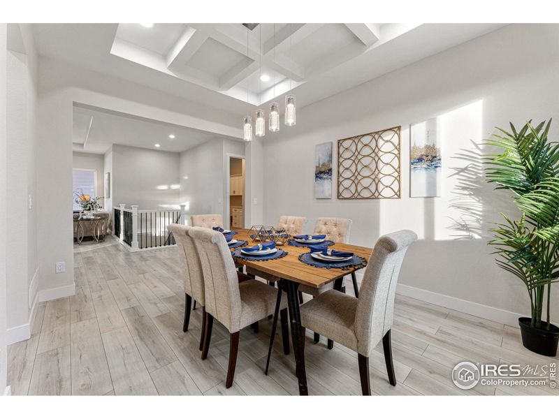 Enjoy the company of family and friends in this ample dining room space.