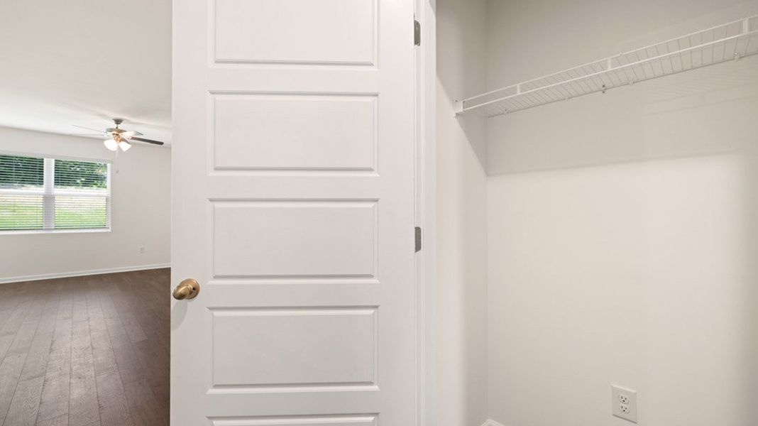 Representative unfurnished interior of a home built from the Kerry by D.R. Horton in Cottages at Blue Ridge, Bonaire (Image 28).