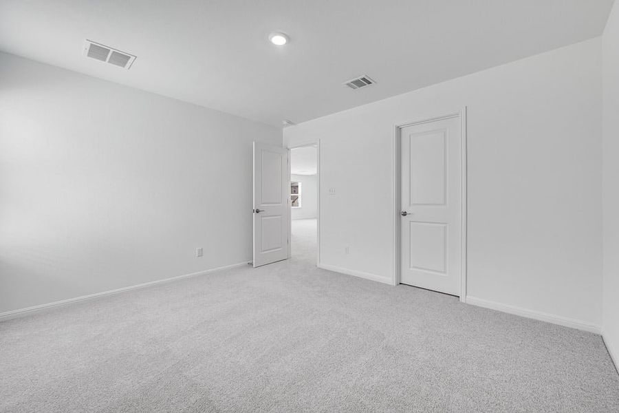 Representative unfurnished interior of a home built from the Wren by Taylor Morrison in Turner's Crossing 50s, Austin (Image 17).