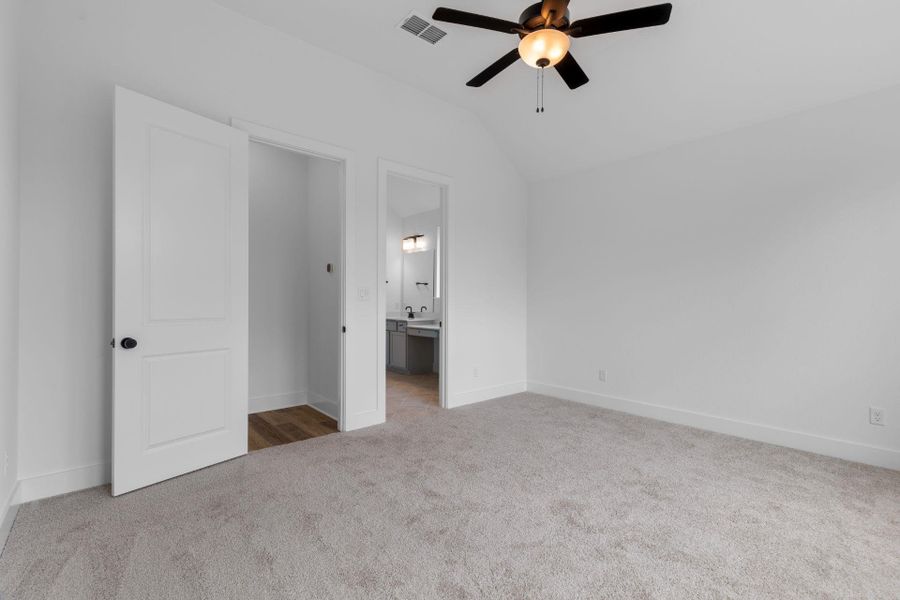 Primary Bedroom with elevated ceiling