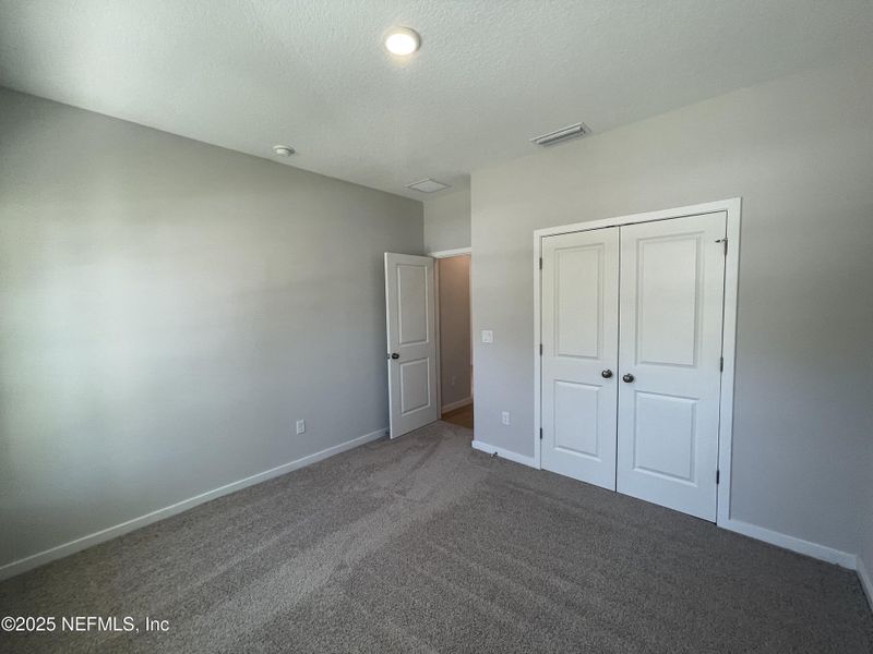 Spacious, unfurnished interior of a new home in The Magnolia Series at Reserve East, Flagler Beach (Image 14).