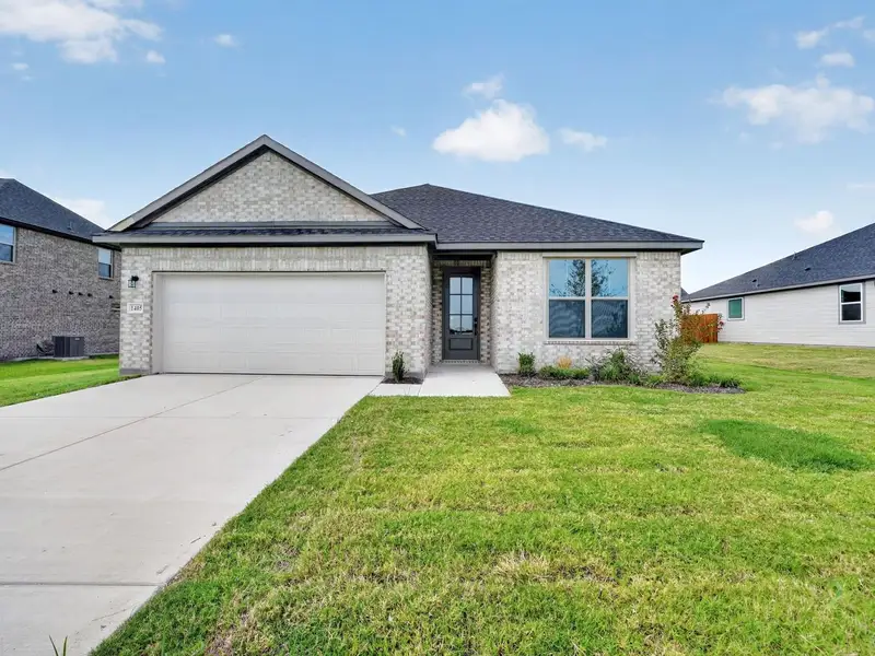 Front exterior of a new home in Meadow Ridge Estates, Josephine, TX, highlighting curb appeal (Image 24).
