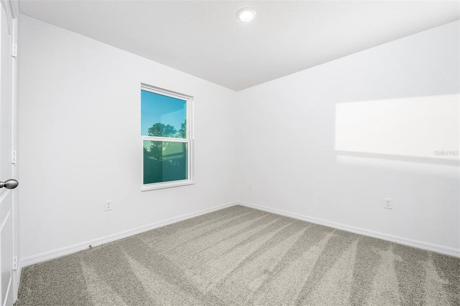 Spacious, unfurnished interior of a new home in Tula Parc, Astatula (Image 20).