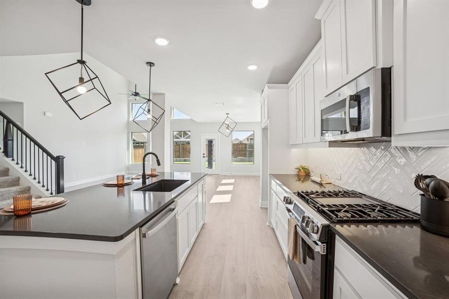Furnished interior view inside a new home in Creekshaw – Classic, Royse City (Image 9). Furnished interior view inside a new home in Creekshaw – Classic, Royse City (Image 9).