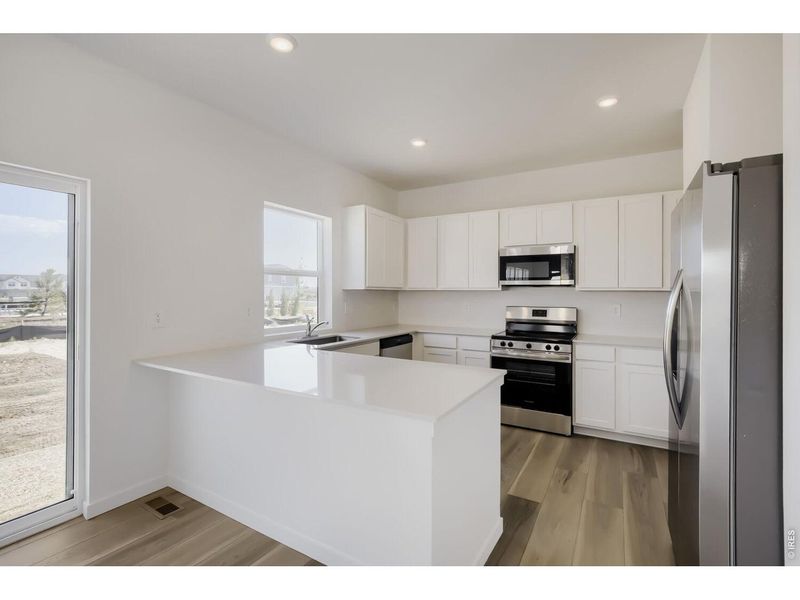 Furnished interior view inside a new home in Kinston, Loveland (Image 4).