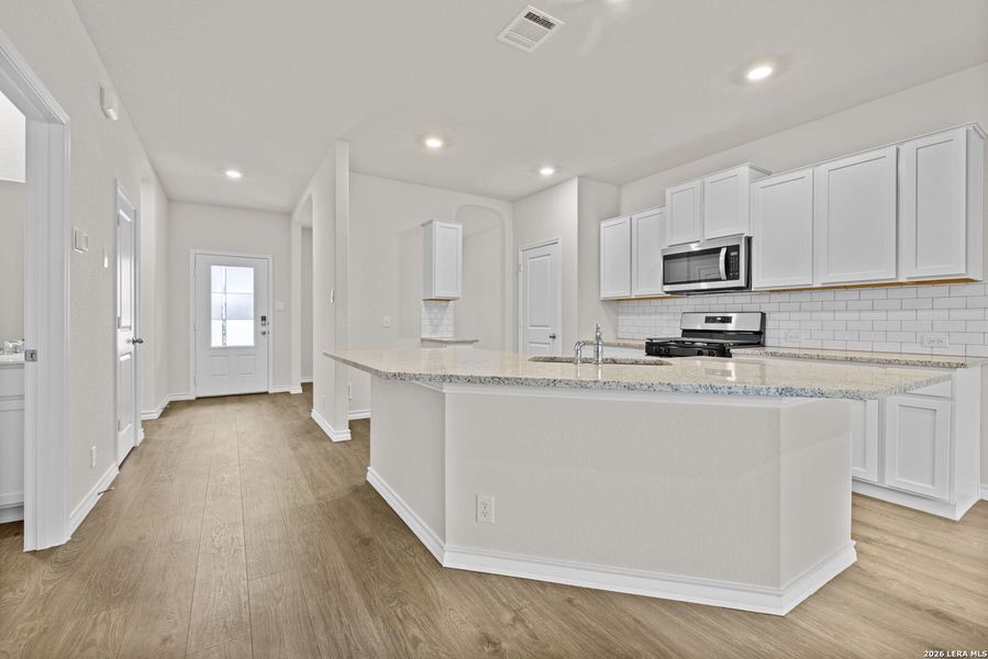 Furnished interior view inside a new home in Redbird Ranch, San Antonio (Image 9).