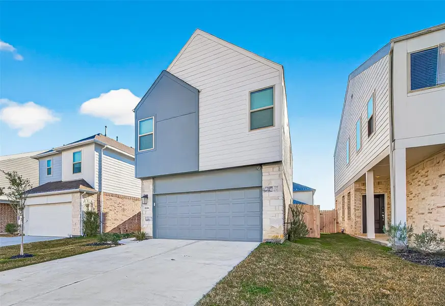 Front exterior of a new home in , Hockley, TX, highlighting curb appeal (Image 2). Front exterior of a new home in , Hockley, TX, highlighting curb appeal (Image 2).