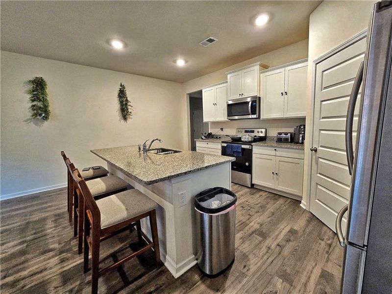 Furnished interior view inside a new home in Oakchase at Hampton, Hampton (Image 14).