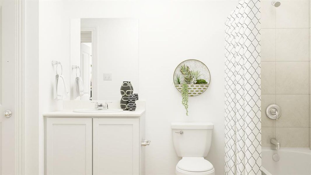 Full bathroom featuring shower / tub combo with curtain, vanity, and toilet