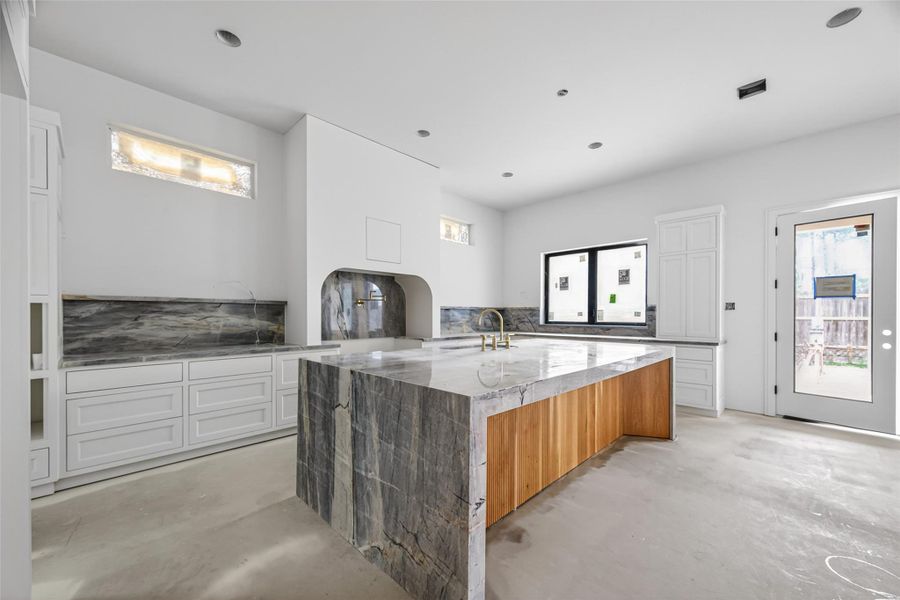 Beautiful large island and look at that detailed carpentry work