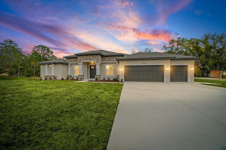 Front exterior of a new home in , Spring Hill, FL, highlighting curb appeal (Image 30). Front exterior of a new home in , Spring Hill, FL, highlighting curb appeal (Image 30).