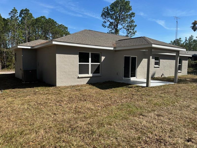 Exterior details and patio area of a home in , Citrus Springs (Image 22).