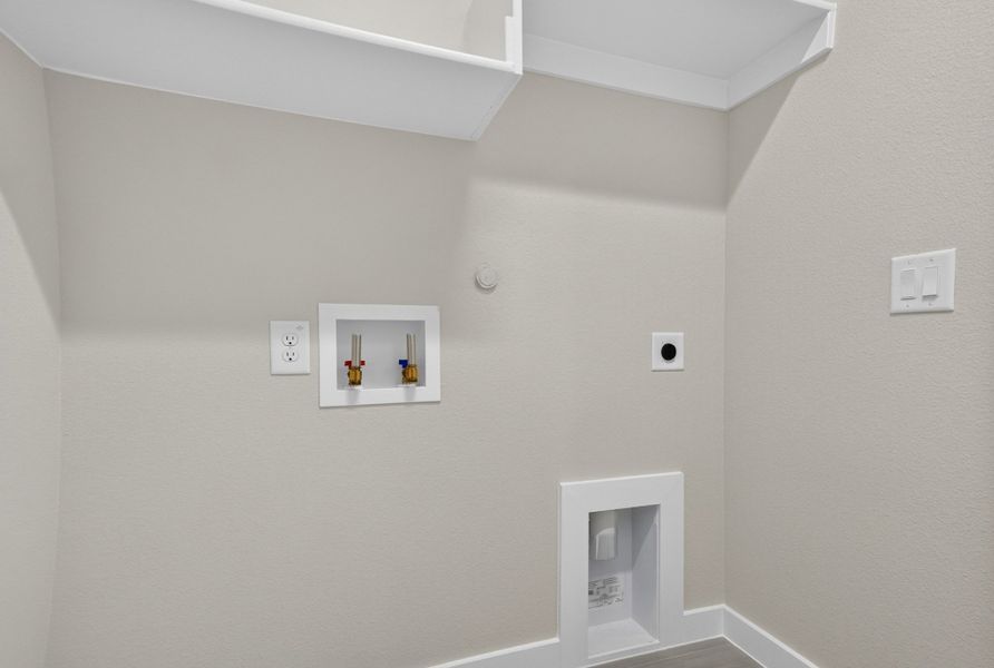 Spacious, unfurnished interior of a new home in The Tribute, The Colony (Image 45).