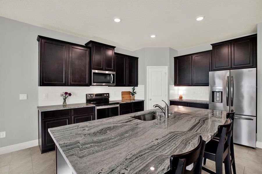 Furnished interior view inside a new home in Woodcreek, Wesley Chapel (Image 6).