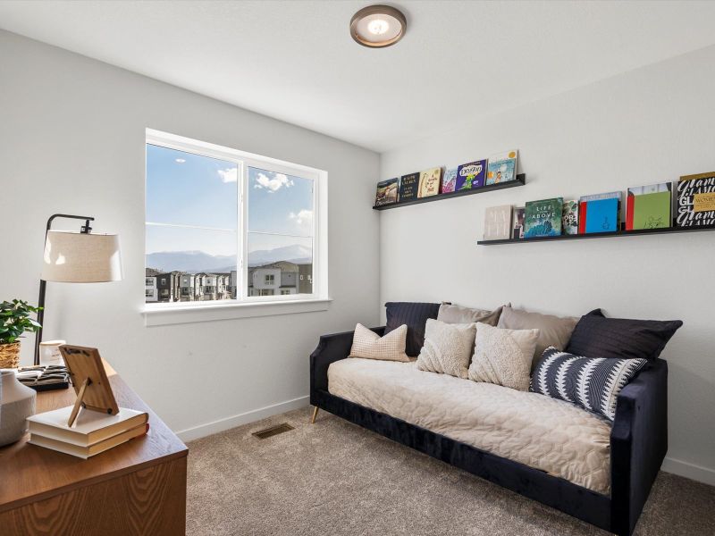 Furnished interior view inside a new home in The Commons at Victory Ridge, Colorado Springs (Image 10).