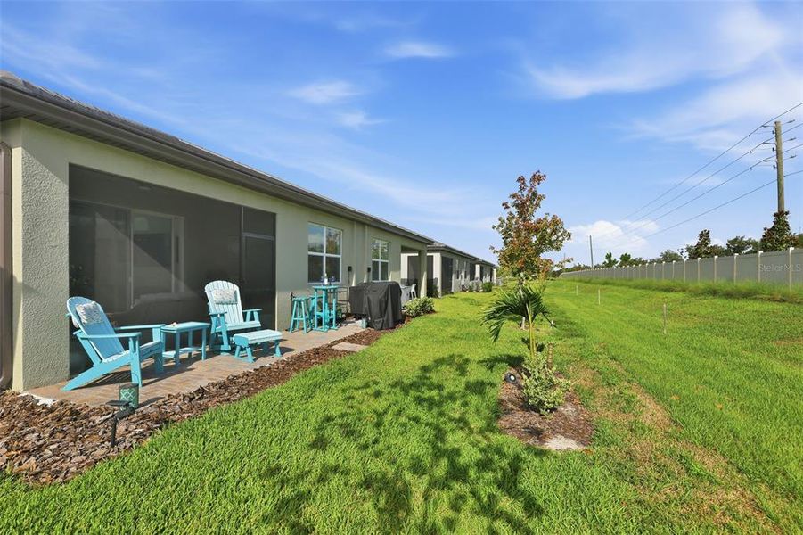 Exterior details and patio area of a home in Prosperity Lakes Active Adult, Parrish (Image 24).