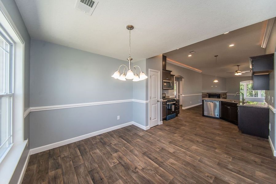 Representative unfurnished interior of a home built from the Jackson by Enchanted Homes in Lonesome Dove, San Antonio (Image 25).