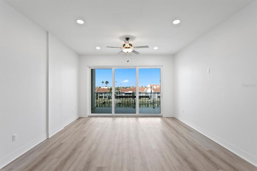 Spacious, unfurnished interior of a new home in Residences at Town Center, Madeira Beach (Image 23).