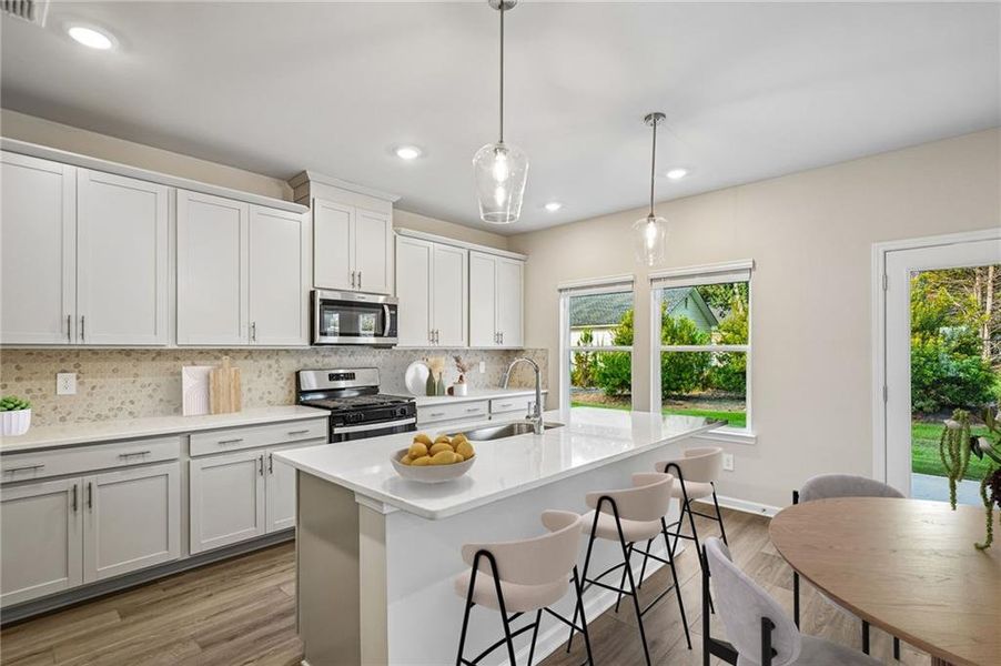 Furnished interior view inside a new home in Martin Springs - Estate Series, Lawrenceville (Image 15).