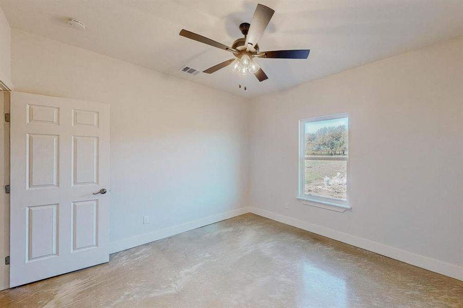 Spare room featuring ceiling fan