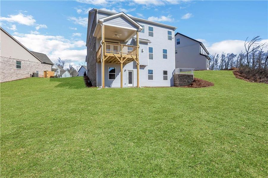 Exterior details and patio area of a home in Cambridge, Flowery Branch (Image 27).