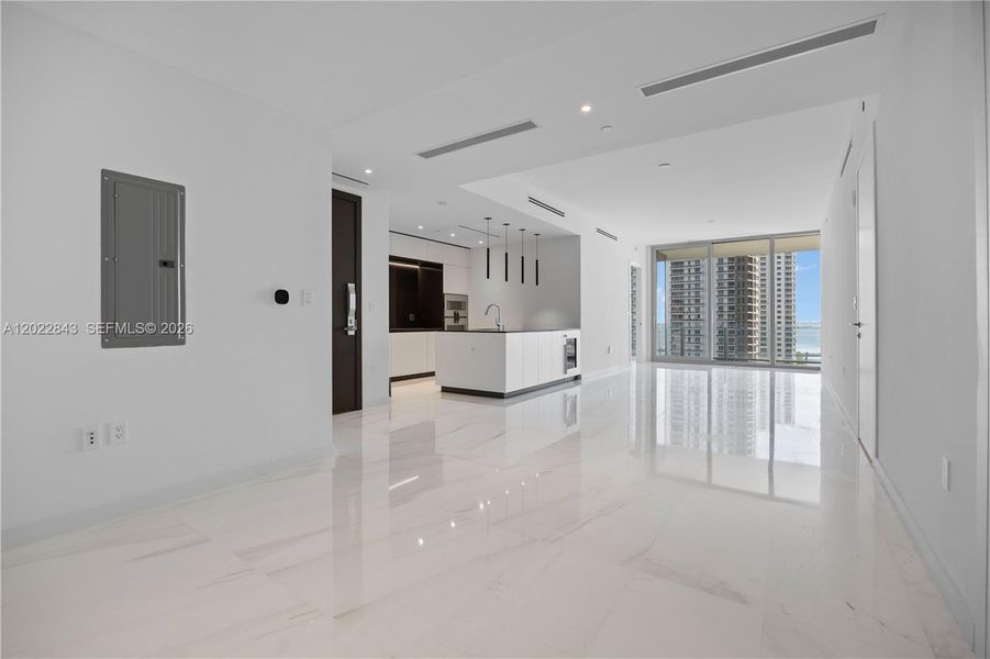 Spacious, unfurnished interior of a new home in Aston Martin Residences, Miami (Image 18).