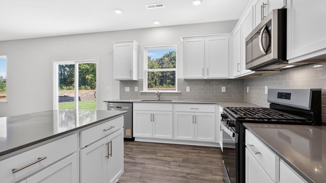 Furnished interior view inside a new home in The Reserve at Prestleigh, Wake Forest (Image 6). Furnished interior view inside a new home in The Reserve at Prestleigh, Wake Forest (Image 6).