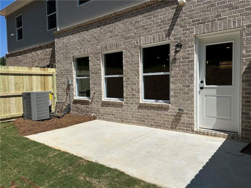 Exterior details and patio area of a home in Wildwood Place, Powder Springs (Image 3).