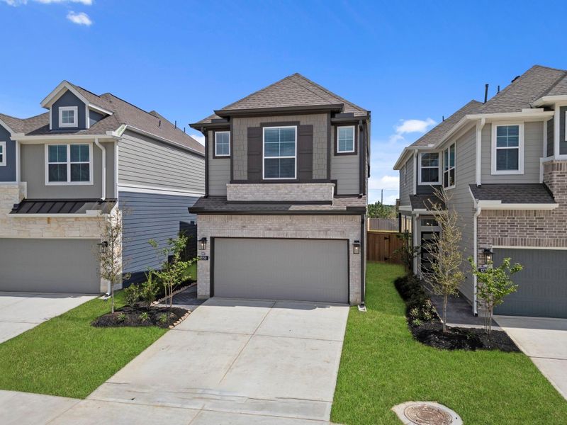 Front exterior of a new home in Bridgeland, Cypress, TX, highlighting curb appeal (Image 15).